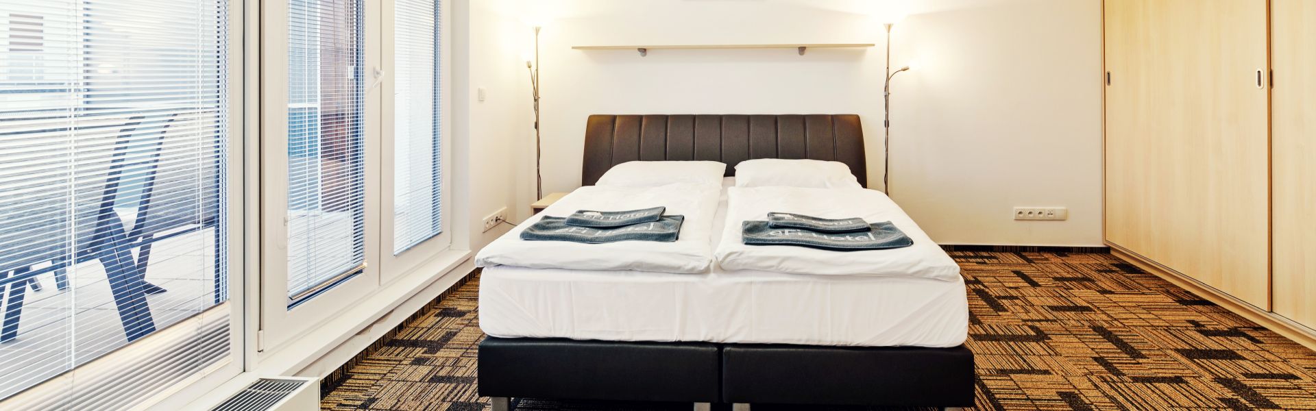 VIP apartmán - VIP apartmán se třemi samostatnými ložnicemi a obývacím pokojem s kuchyňským koutem